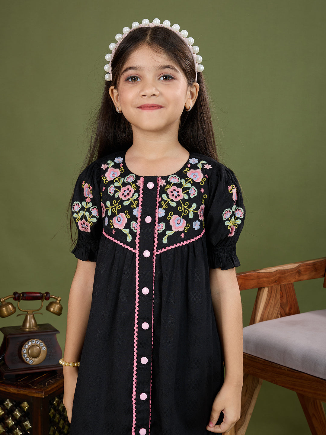 TINY TWILLS Girls Black Cotton Frock – Floral Embroidered Dress with Pink Button Detailing & Puff Sleeves | Ethnic Party Wear for Kids