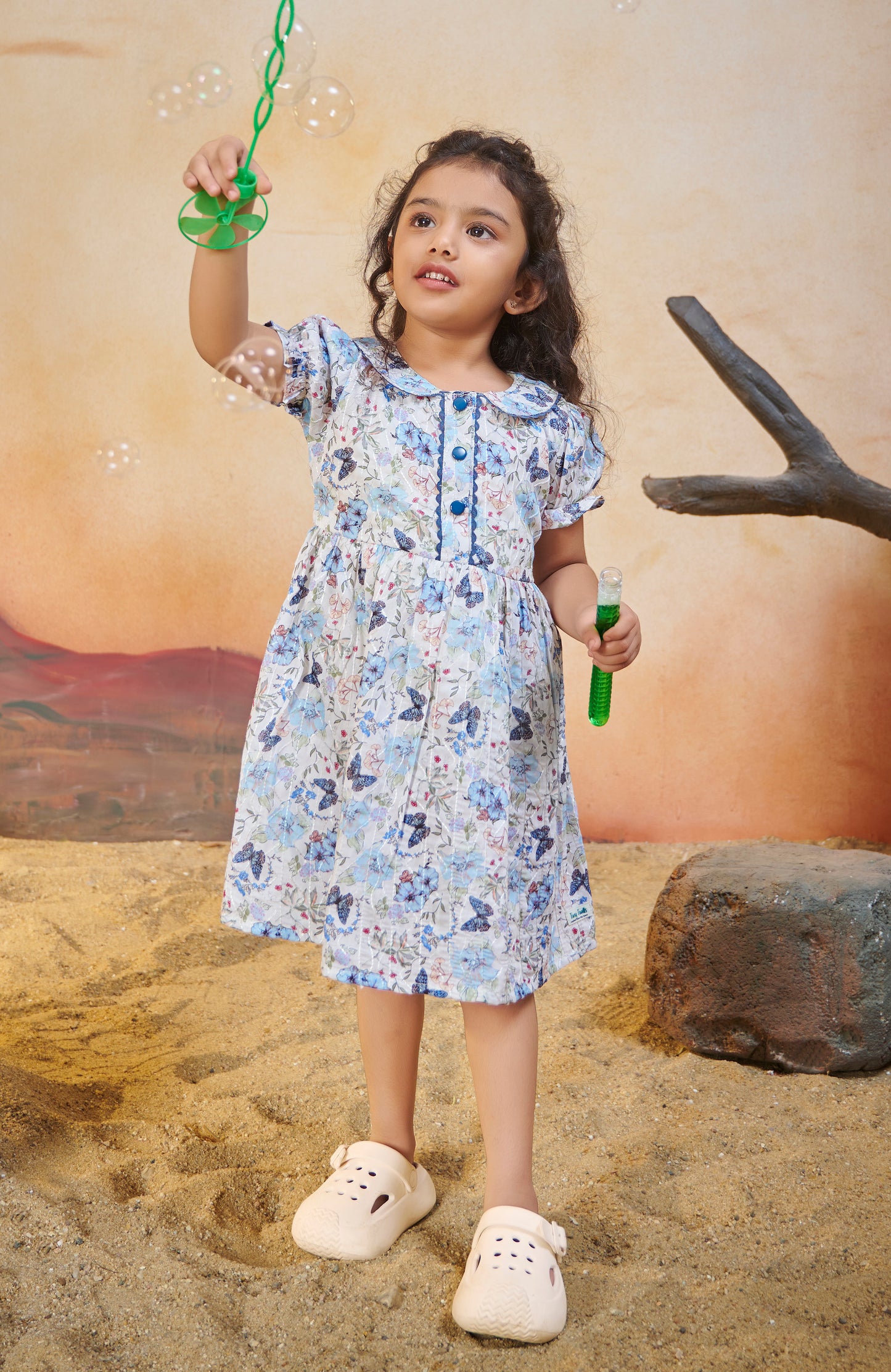 TINY TWILLS MUSLIN AARI BUTTERFLY PRINTED FRONT BUTTONED FROCK