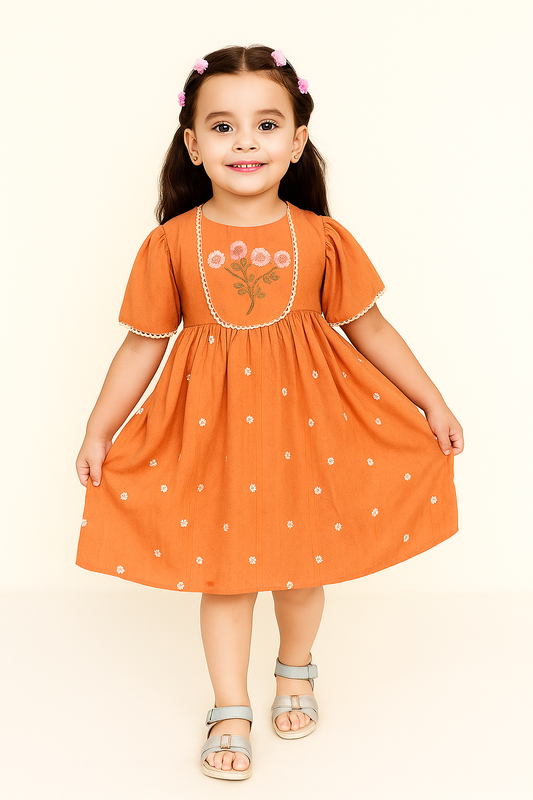 TINY TWILLS Girls Cotton Frock – Rust Orange Floral Embroidered Dress with Puff Sleeves & Dainty Lace Trim | Summer Party Wear for Kids