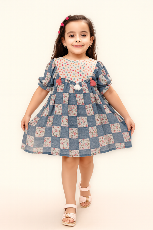 TINY TWILLS Girls Cotton Frock – Checkered Patch Dress with Floral Print & Tassel Detail | Casual Flared Dress for Girls