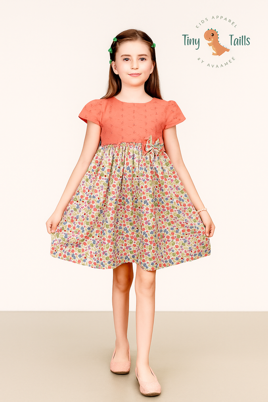 TINY TWILLS Girls Cotton Frock – Coral Eyelet Bodice with Colorful Floral Skirt & Bow Detail | Bright Summer Casual Wear for Kids