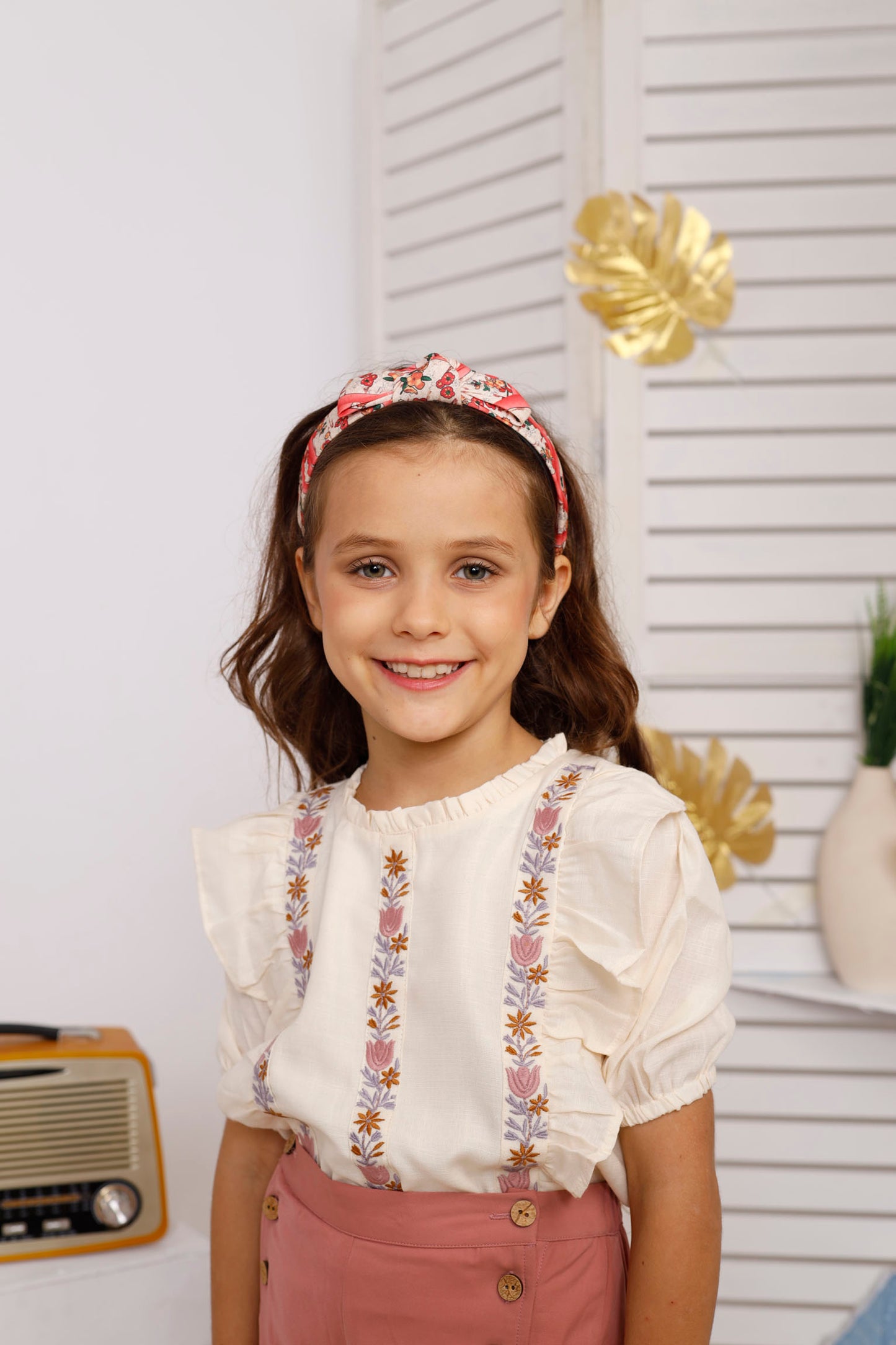 WHITE EMBROIDERED TOP PAIRED WITH PINK FLARED  PANTS