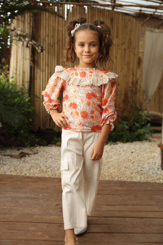 FLOWER PRINTED TOP WITH  CROCHET FRILL PAIRED WITH  OFF - WHITE CARGO PANTS