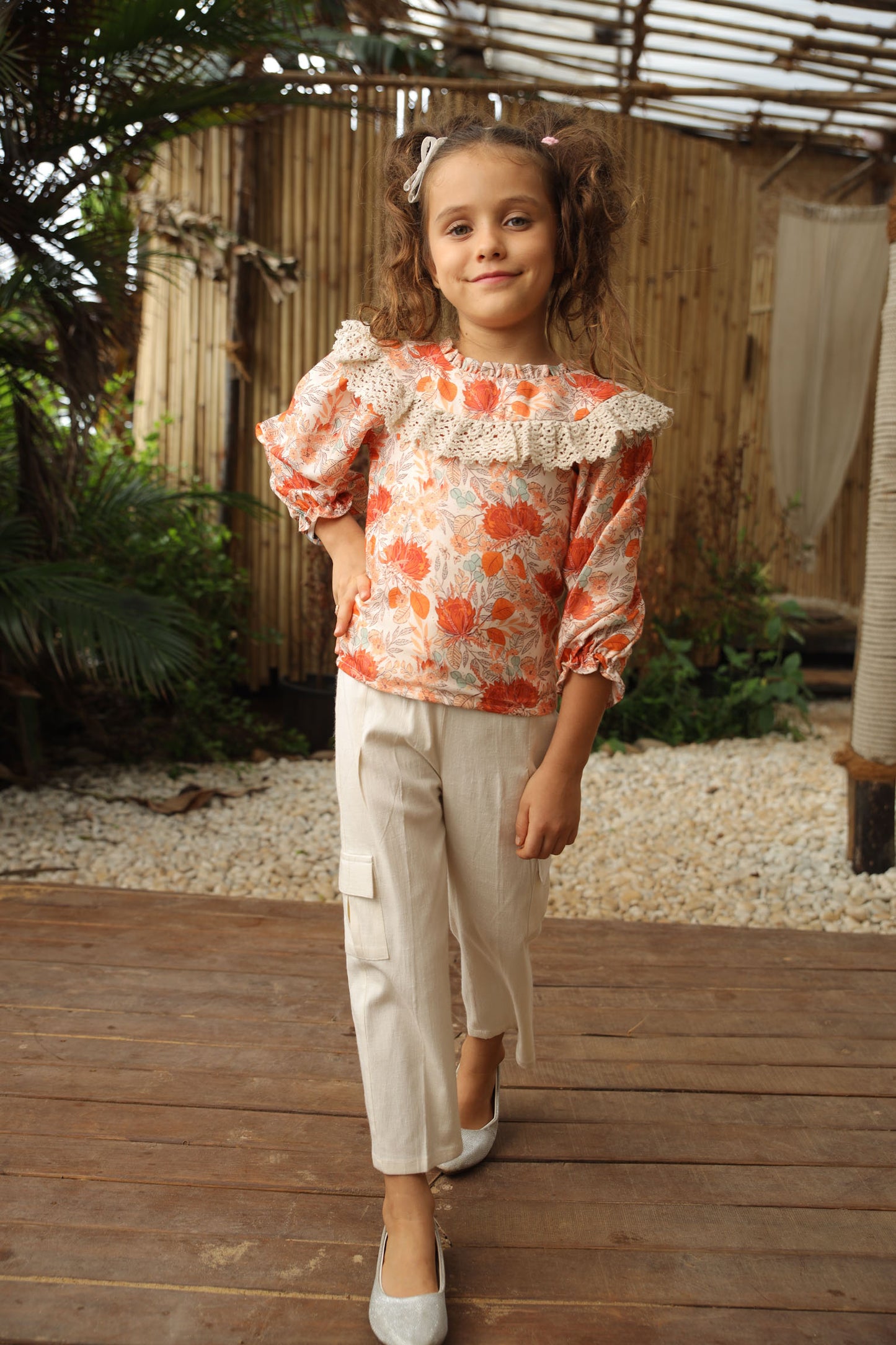 FLOWER PRINTED TOP WITH  CROCHET FRILL PAIRED WITH  OFF - WHITE CARGO PANTS