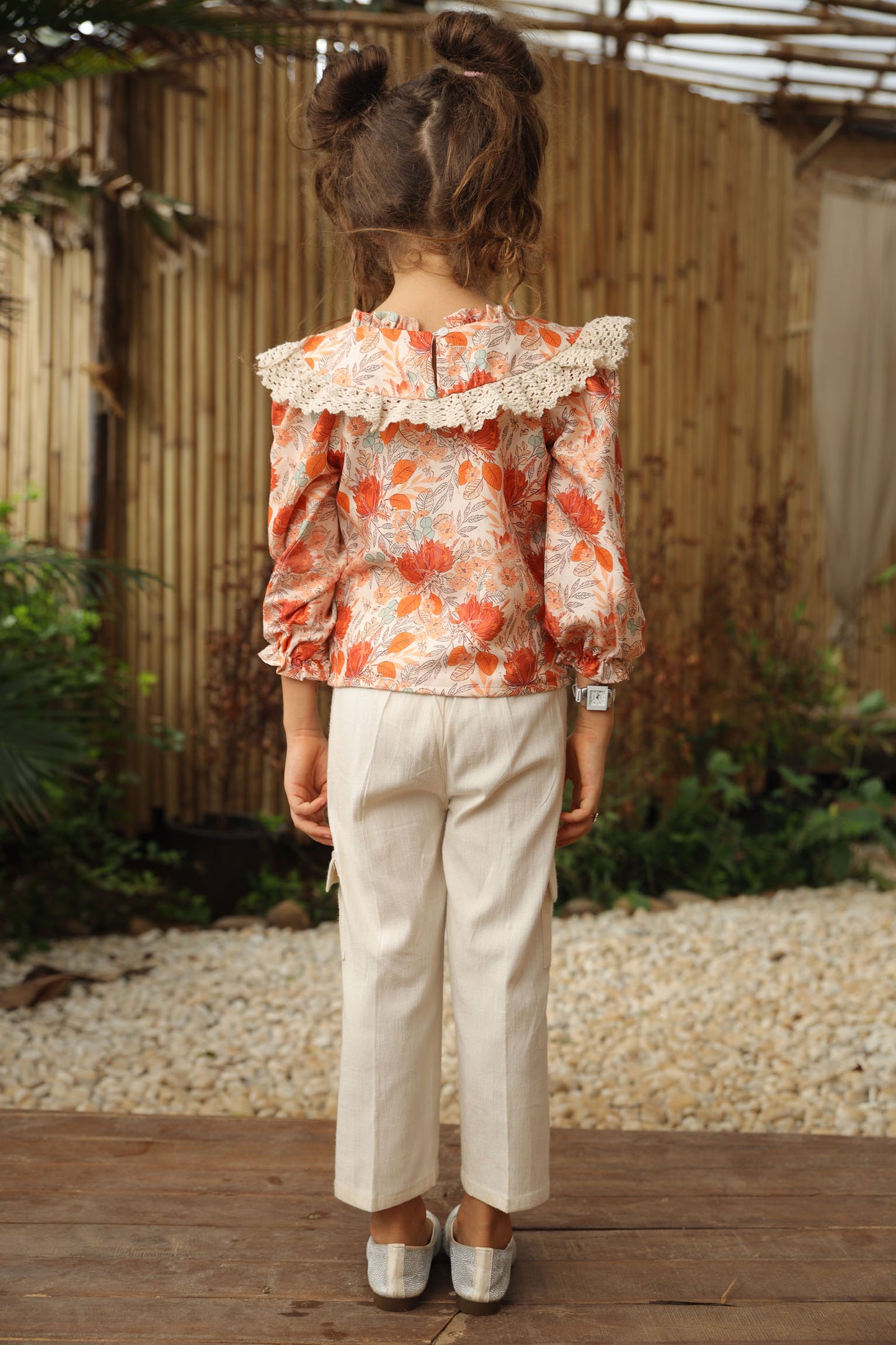 FLOWER PRINTED TOP WITH  CROCHET FRILL PAIRED WITH  OFF - WHITE CARGO PANTS